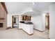 Cozy wet bar with wood cabinets and granite countertop, conveniently located near living area at 16301 E Ida Ave, Centennial, CO 80015