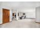 Expansive basement with a media area, office space, and extra room, perfect for entertaining or relaxing at 16301 E Ida Ave, Centennial, CO 80015