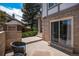 Inviting patio featuring comfortable seating and a charming garden wall, providing a private outdoor space for relaxation at 16301 E Ida Ave, Centennial, CO 80015