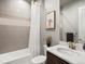 Cozy bathroom with modern fixtures, a shower-tub combination, and stylish decor at 2113 Fountain Cir, Erie, CO 80516