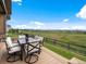 Deck area includes outdoor table, chairs and scenic views of the neighborhood at 2113 Fountain Cir, Erie, CO 80516
