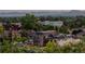 Aerial view of a house with mountain views in the background at 1601 Yates St, Denver, CO 80204