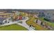 A playground with walking paths and benches surrounded by new homes at 4206 Sandstone Dr, Mead, CO 80504