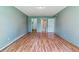 Generous bedroom with hardwood flooring and multiple closets for ample storage solutions at 13626 E Bates Ave # 110, Aurora, CO 80014