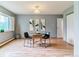 Cozy dining area with a round table and chairs, with bright and sunny exposure at 13626 E Bates Ave # 110, Aurora, CO 80014
