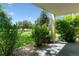 Inviting patio view with lush landscaping and green lawns, creating a serene and private outdoor space at 13626 E Bates Ave # 110, Aurora, CO 80014