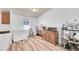 Bright dining area with laminate flooring, ample storage, and a well lit window at 6631 E 78Th Avenue Ave, Commerce City, CO 80022