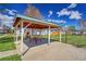 Outdoor picnic table and shaded pavilion, ideal for gatherings at 6631 E 78Th Avenue Ave, Commerce City, CO 80022