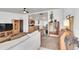 Open-concept living room showcasing seamless flow to the kitchen with ample seating at 6631 E 78Th Avenue Ave, Commerce City, CO 80022