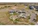 Aerial view of a community with a park and parking lot at 11291 Star Streak Rd, Littleton, CO 80125