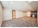 Finished basement area with carpet, recessed lighting, and a built in cabinet area at 3597 S Joplin St, Aurora, CO 80013
