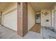 Welcoming front porch with a wooden ramp and a security door, ensuring accessibility and safety at 3597 S Joplin St, Aurora, CO 80013
