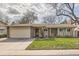 Charming ranch-style home featuring a well-manicured lawn and a two-car attached garage, inviting and functional at 3597 S Joplin St, Aurora, CO 80013