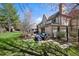 Inviting backyard with patio, outdoor kitchen and dining area, perfect for entertaining and relaxing at 6375 E Tufts Ave, Englewood, CO 80111