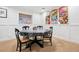 playroom with a round table, chairs, and colorful artwork on display at 6375 E Tufts Ave, Englewood, CO 80111