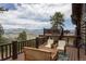 Wide wooden deck with a mountain view at 29095 Summit Ranch Dr, Golden, CO 80401