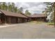 Expansive log home with attached garages and lovely landscaping at 29095 Summit Ranch Dr, Golden, CO 80401