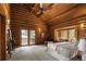 Beautiful bedroom featuring a private balcony with outdoor views and comfortable seating at 29095 Summit Ranch Dr, Golden, CO 80401