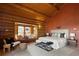Inviting main bedroom with a bay window, natural light, and comfortable seating area at 29095 Summit Ranch Dr, Golden, CO 80401