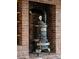 Close-up of a rustic-looking wood burning stove at 29095 Summit Ranch Dr, Golden, CO 80401