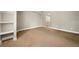 Bedroom with carpet, built-in shelving, and access to ensuite bathroom at 1635 N Franklin St, Denver, CO 80218