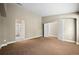Bedroom with carpet, walk-in closet, and ensuite bathroom at 1635 N Franklin St, Denver, CO 80218
