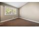 Cozy bedroom featuring a large window letting in natural light and neutral paint at 1635 N Franklin St, Denver, CO 80218