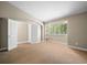 Spacious bedroom with ample closet space and large window at 1635 N Franklin St, Denver, CO 80218