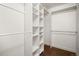 Walk-in closet with custom shelving and ample storage space at 1635 N Franklin St, Denver, CO 80218