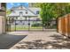 Exterior view of home showing gate access from the street at 1635 N Franklin St, Denver, CO 80218