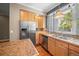 Updated kitchen featuring stainless steel appliances and granite countertops at 1635 N Franklin St, Denver, CO 80218