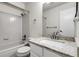 Bathroom featuring a tub, toilet, and a granite vanity at 16928 Dandelion Way, Parker, CO 80134