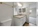 Clean bathroom featuring a granite countertop and a neutral color palette at 16928 Dandelion Way, Parker, CO 80134