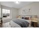 Comfortable bedroom with a large window and neutral decor at 16928 Dandelion Way, Parker, CO 80134