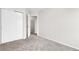 Cozy bedroom featuring neutral walls, carpet flooring, and closet at 16928 Dandelion Way, Parker, CO 80134