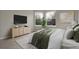 Cozy bedroom with two windows offering lots of natural light at 16928 Dandelion Way, Parker, CO 80134