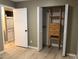 Bedroom closet includes a closet with shelving, drawers and a view into the laundry room at 7933 Countryside Dr # 120, Niwot, CO 80503