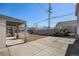 An outdoor living space with a concrete patio and wooden fence at 1940 E 95Th Ave, Thornton, CO 80229