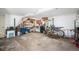 Spacious garage with ample storage space, workbench area, and easy access for projects and parking at 1940 E 95Th Ave, Thornton, CO 80229