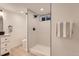 Sleek bathroom with a tiled shower and modern fixtures offering a clean and functional space at 4475 S Routt St, Littleton, CO 80127