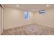 Neutral bedroom with carpet and a small window offering simplicity and functionality at 4475 S Routt St, Littleton, CO 80127