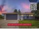 Charming single-story home with a large two-car garage and a cozy front porch, perfect for suburban living at 4475 S Routt St, Littleton, CO 80127