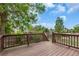 The wood deck overlooks a large private fenced in yard, perfect for outdoor living at 1005 S Lewiston Way, Aurora, CO 80017
