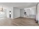 Spacious living room offering stylish floors and ample space for relaxation and entertaining at 1005 S Lewiston Way, Aurora, CO 80017