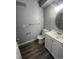 Clean bathroom with a white vanity, toilet, and shower/tub combo at 2678 S Xanadu Way # C, Aurora, CO 80014