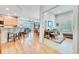 Open floor plan features a kitchen, office space, and Gathering room at 7193 S Versailles Way, Aurora, CO 80016