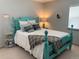 Serene bedroom with a stylish bed frame, comfortable bedding, and a peaceful ambiance at 10634 Ashfield St, Highlands Ranch, CO 80126