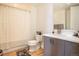Clean, modern bathroom with wood flooring, shower, and vanity with sink at 1750 Wewatta St # 728, Denver, CO 80202