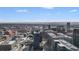 Expansive city view showcasing modern architecture, transportation hubs, and a mountainous backdrop at 1750 Wewatta St # 728, Denver, CO 80202