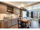 Modern kitchen with stainless steel appliances and a downtown view at 1750 Wewatta St # 728, Denver, CO 80202